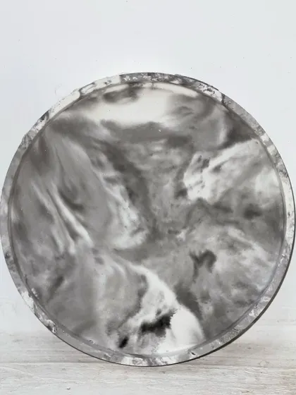 This round tray features a beautiful Indian Statuario marble effect that I created with concrete. The marbling technique is always a nervous but satisfying process!