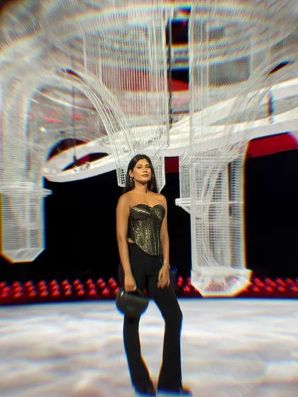 My own red carpet moment at the Gaurav Gupta bridal couture show. I’m standing in front of the incredible wireframe art installation in a custom-made corset top.