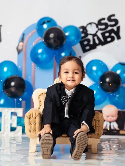 Looking cool and confident in his little suit, this 'Boss Baby' is ready for his close-up.