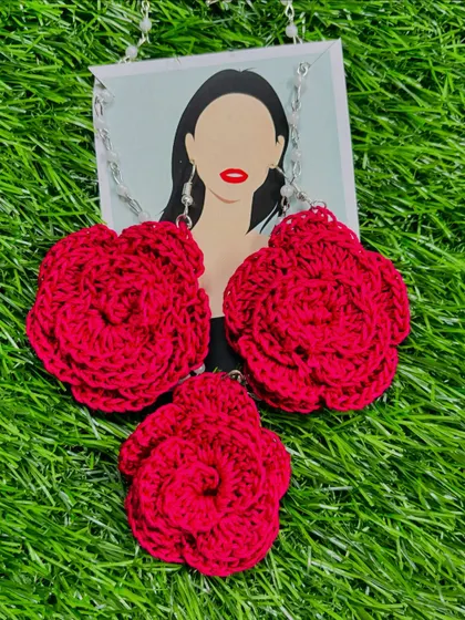 My classic red rose crochet jewelry set, featuring a floral pendant necklace and matching earrings. Each piece is carefully handcrafted from soft cotton thread, offering a bold and romantic look.