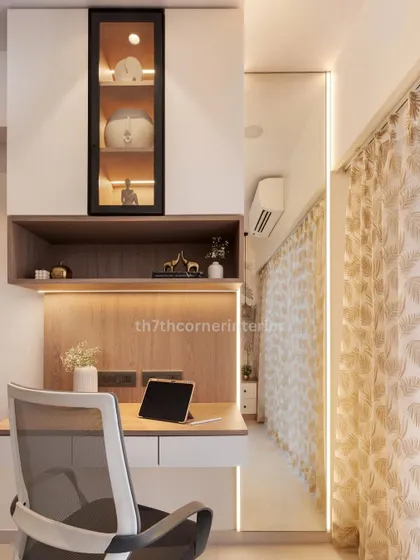 This multi-functional unit includes a study desk and a dressing area with a full-length mirror and concealed lighting. The glass-shuttered niche in the overhead storage adds a touch of elegance.