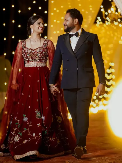 A stylish couple making their entrance at the reception. We focus on capturing the fashion, the mood, and the excitement of the evening's celebrations.