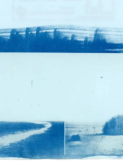 A close-up of the desolate landscape captured in a cyanotype print on an inland letter. The brushstrokes and deep blue tones elevate the humble stationery into a work of art.
