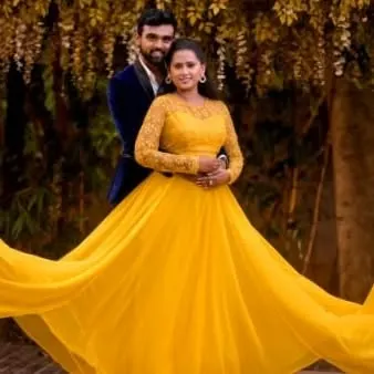 A beautiful portrait from a pre-wedding shoot. I provided this vibrant yellow gown and styled her hair and makeup to create a bright and joyful look.