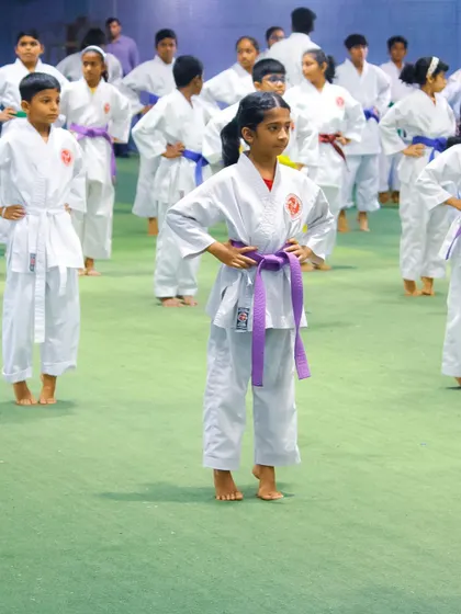 Students stand at attention, displaying the discipline and readiness that is a hallmark of our training at OSK Academy.