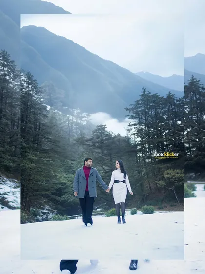 An artistic collage of a couple in a snowy landscape, with a graphic overlay creating a modern and stylish album page.