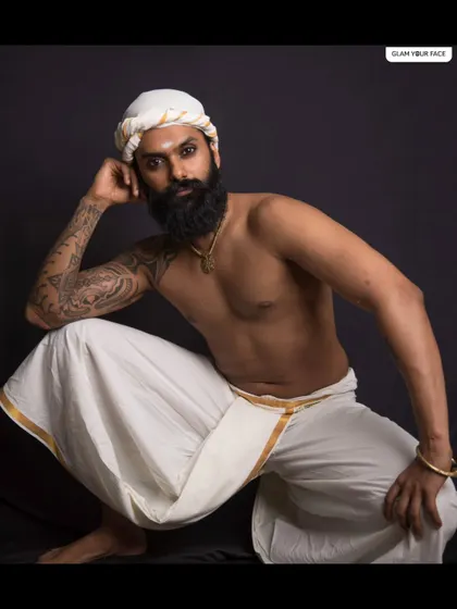A powerful pose from the traditional jewellery shoot. The smudged kohl on the male model adds an element of raw intensity that complements the overall theme.