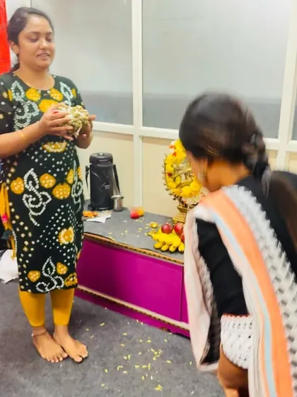 Another moment from the Gejje Pooja, where a student receives her blessed ankle bells.
