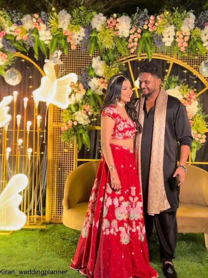 Another shot of the stylish Sangeet night, capturing the couple's chemistry against the modern, beautifully lit backdrop.
