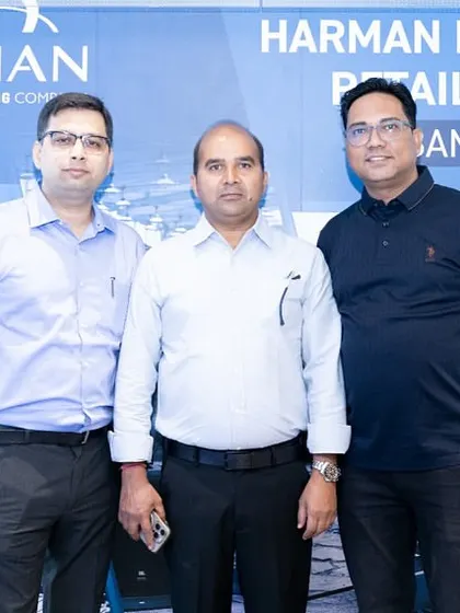 Posing with my colleagues at the Harman Professional Summit. My team is the backbone of Apex Solutions, and our collective expertise ensures every client receives knowledgeable advice and support.