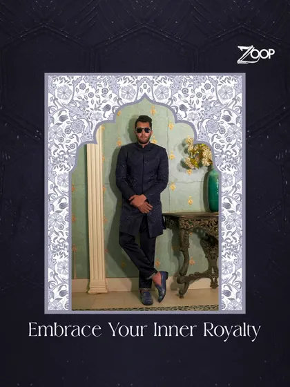 Embrace your inner royalty with this regal navy blue ensemble from the Jazbaat collection. The detailed texture and sharp tailoring are designed for the man who carries himself with confidence.
