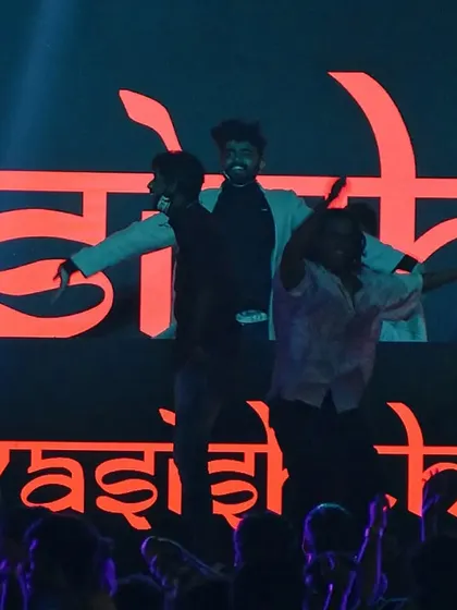 My crew and I jumping on stage in front of my logo. This is the energy we bring.