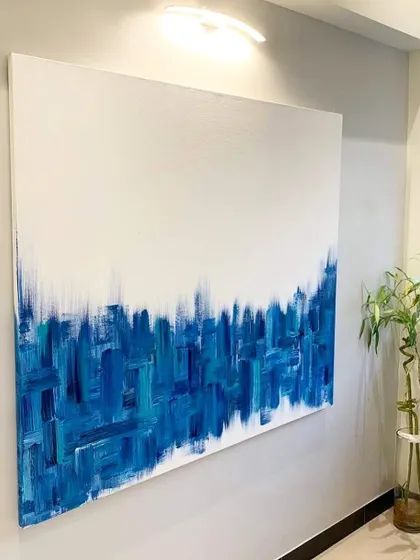 A large abstract piece commissioned for a client's home. The cool blue tones and sharp, vertical brushstrokes create the feeling of a minimalist city skyline at dusk.