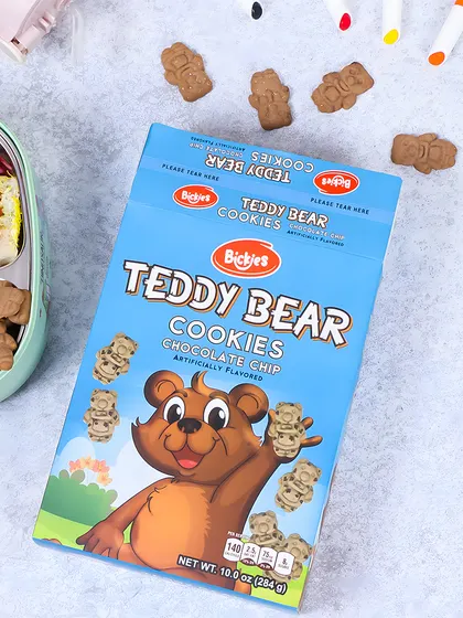 This image shows the cookies as part of a packed lunchbox. This is a highly effective lifestyle shot that demonstrates a clear use case and positions the product as a go to snack for school lunches.
