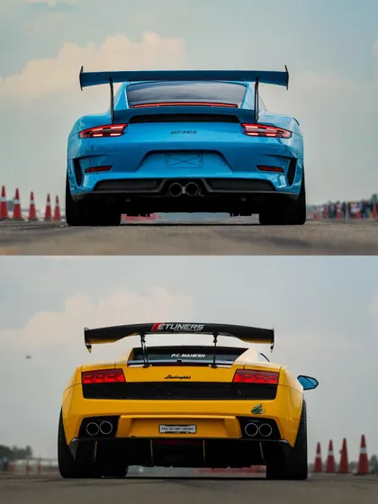 Another look at the iconic Porsche and Lamborghini, two titans of speed ready for battle. The visual appeal of these machines is a huge draw for sponsors and spectators alike.