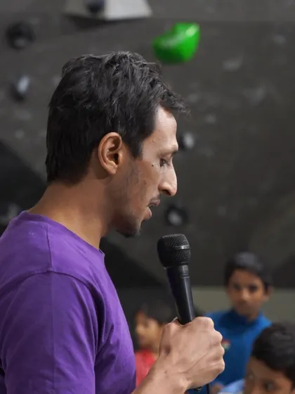 Our coach speaks to the young participants at our Kids Climbing Competition. We focus on creating a supportive atmosphere where kids can challenge themselves, celebrate their efforts, and have a ton of fun.