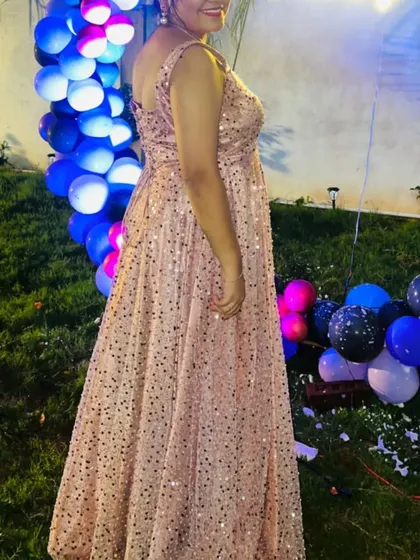 Celebrate your birthday in style with one of my designed outfits. This pink sequin gown is a fun and glamorous option, available for rent at budget-friendly prices.