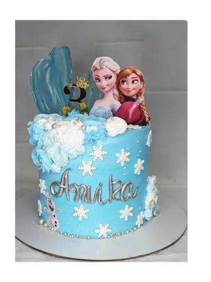 Let it go! This Frozen themed cake is a fresh pineapple flavor, decorated with snowflakes and an icy blue color scheme. It's perfect for a magical winter birthday.