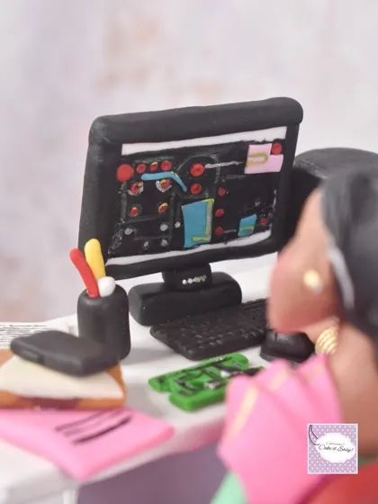 Another close-up of the tiny details on the desk, including the circuit boards and pen stand.