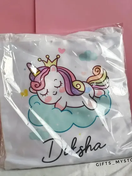 A personalized pillow with a sleepy unicorn design. How cute is this for a birthday princess?