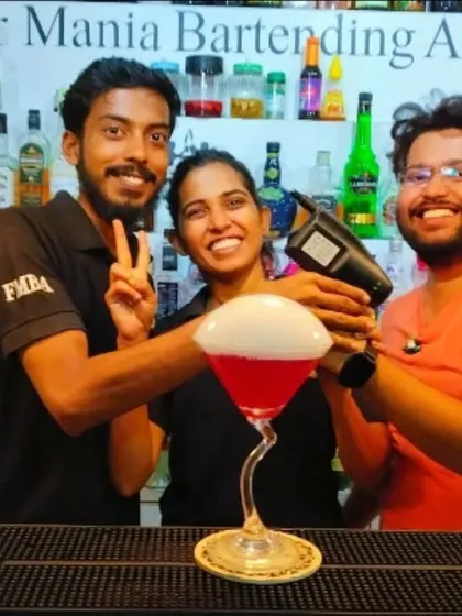 Our team celebrating the successful creation of a giant bubble cocktail. We love pushing the boundaries of mixology.