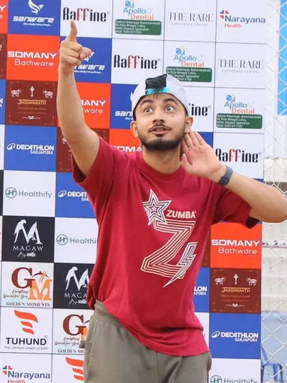 Striking a pose during the Decathlon event. We bring fun, flair, and fitness to every stage we step on.