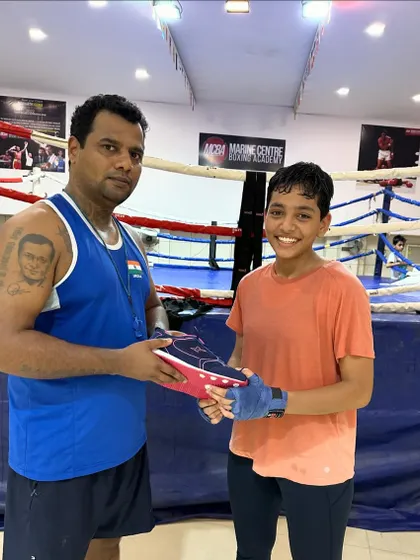 Another shot of me with Vedika and her new shoes. This is a small token of appreciation for her dedication and for representing our academy at the national level.