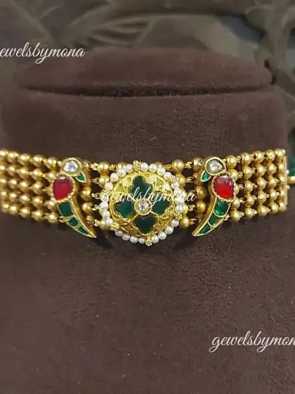 The front view of the Dakshinaya choker, showcasing its elegant and timeless design. This piece is perfect for pairing with silk sarees for a classic, festive look.