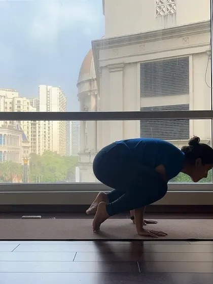 The journey to Bakasana (Crow Pose) begins with learning to shift your weight forward and trust your hands.
