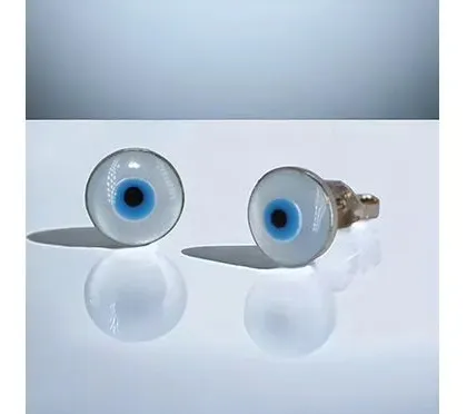 A minimalist take on evil eye studs, this pair features a simple glass design set in silver, perfect for a subtle touch of symbolism.