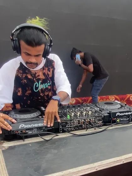 Behind the scenes during a sound check for a show with the artist Vedan. I'm using a professional Pioneer DJ console to ensure the best sound quality.