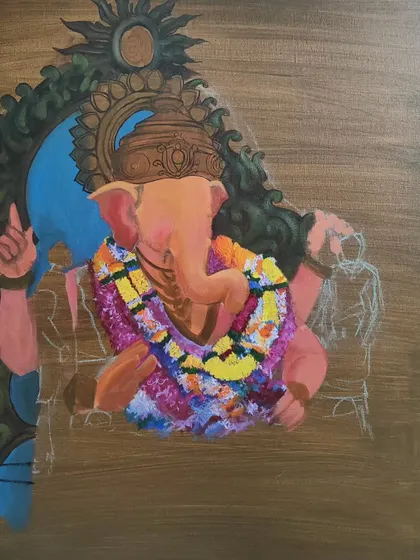 Another view of the Ganesha painting in progress. The background elements and the deity's form are being developed simultaneously to ensure a harmonious final composition.