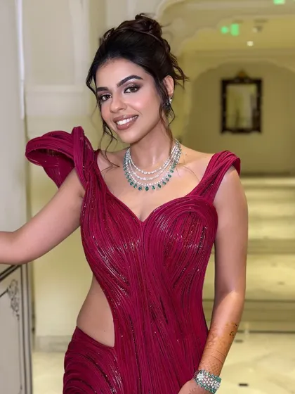 Another shot of this gorgeous cocktail look. The structured gown is balanced with soft, glowing makeup.