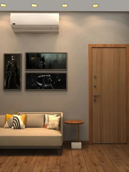 A cozy seating area with a simple sofa and framed superhero art provides a perfect spot for relaxation and reading.