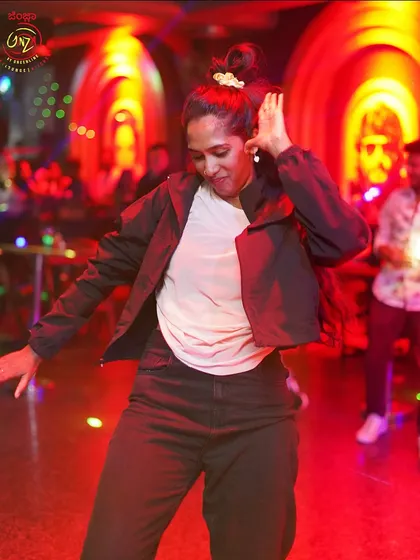 A guest dancing during the Halloween x Diwali party at Ginza.