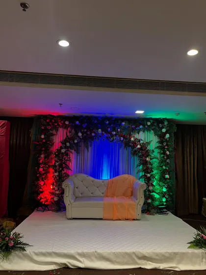 A wide shot of the ring ceremony stage, showing its placement in the banquet hall.