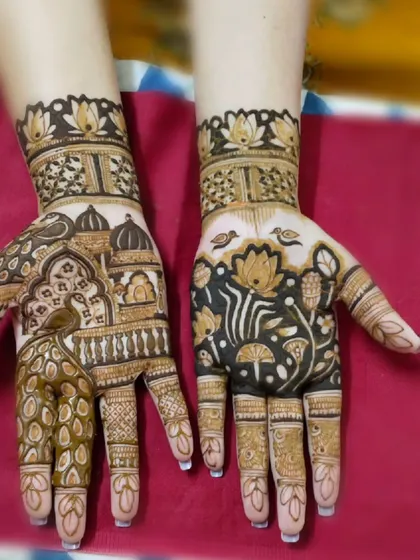 A unique design combining a palace view with a pond of lotuses and birds. This creative and artistic style is perfect for someone who wants their mehndi to be a true piece of art.