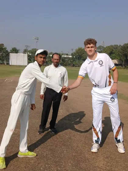 We provide our trainees with international exposure by hosting teams from other countries. This image shows the captains' handshake before a competitive match against the U-16 team from South Africa, fostering sportsmanship and global experience.