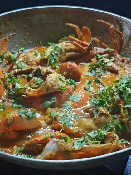 My Malvani Crab Curry is a messy, hands-on, and incredibly rewarding experience. The secret to its spectacular taste is the authentic Malvani masala I use, which makes the sweet crab meat sing.
