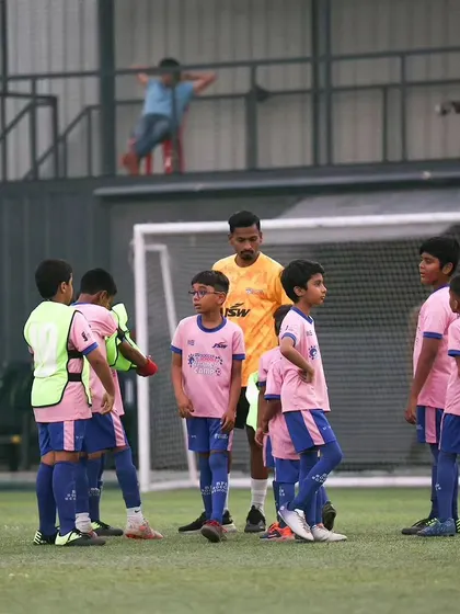 A coach gives a team talk during our Summer Camp in Pune. We are committed to bringing our programs to football lovers across India.