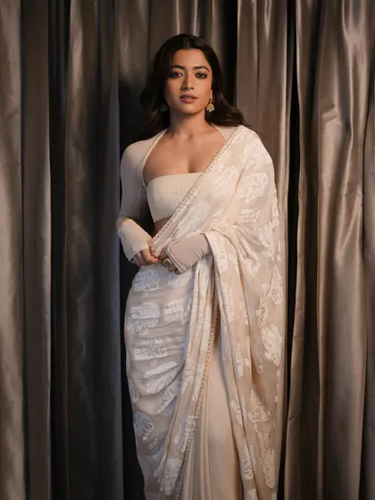 The wonderfully talented Rashmika Mandanna wearing my 18k gold jhumka earrings, cuff, and hummingbird ring. Her powerful presence and grace bring these handcrafted pieces to life.