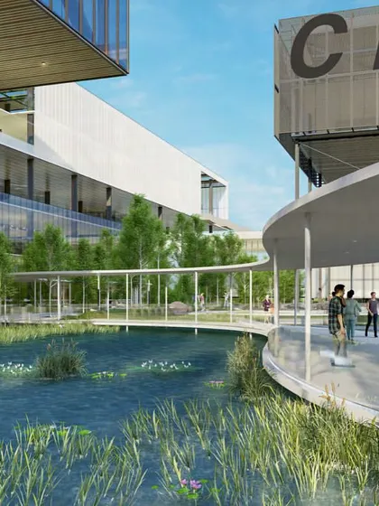 The 'C Lab' at the ePositive campus is part of a larger design that connects multiple buildings with walkways and green spaces. This approach encourages movement and collaboration between different research departments, breaking down traditional silos.