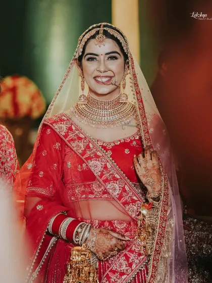 A beautiful, candid shot of the bride's happy smile. Her genuine joy is infectious, and this photo perfectly captures her excitement on the wedding day.