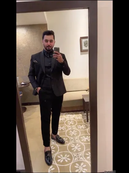 A mirror selfie showing off a full three-piece suit look. This is perfect for a very formal reception or corporate event.