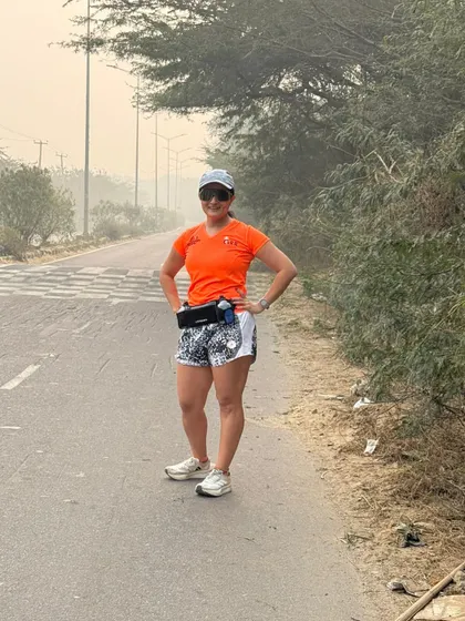 A female runner from our tribe, looking strong and confident during a road run.
