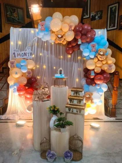 The complete setup for a one-month milestone party. The teddy bear theme is a sweet and timeless choice for celebrating a new baby.