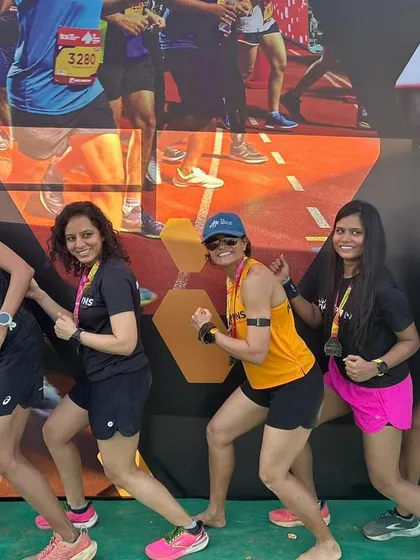 The ladies of the Champions tribe striking a power pose after the TCS 10K. Strong, fast, and having a great time.