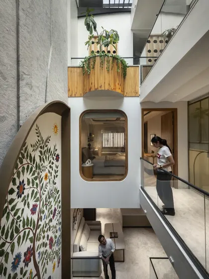 In the Slender House, the main brief was to maintain connection between family members. I designed an inward-looking structure with spaces interconnected via a central, light-filled courtyard, as seen in this view from the upper level.
