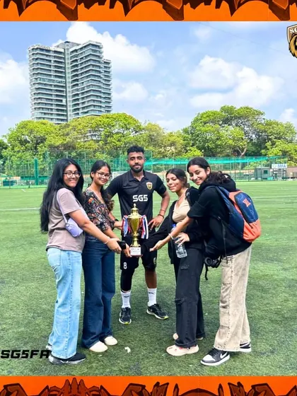 A player surrounded by friends, all sharing in the joy of the team's achievement. This is what being part of a team is all about.