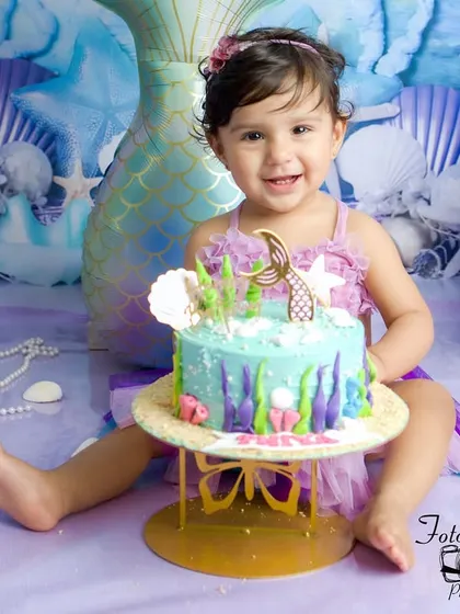 A proud smile from the birthday girl with her beautiful cake. These are the moments of pure happiness that I feel so blessed to capture for families.